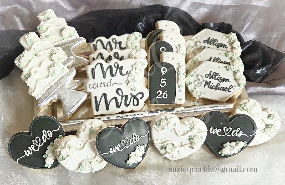 Black and white wedding cookies with Mr and Mrs, hearts and a wedding date